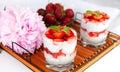 A healthy breakfast dessert with strawberries, yogurt and chia seeds on a wicker tray. Delicious natural and healthy dessert. ÃÂ¡ Royalty Free Stock Photo